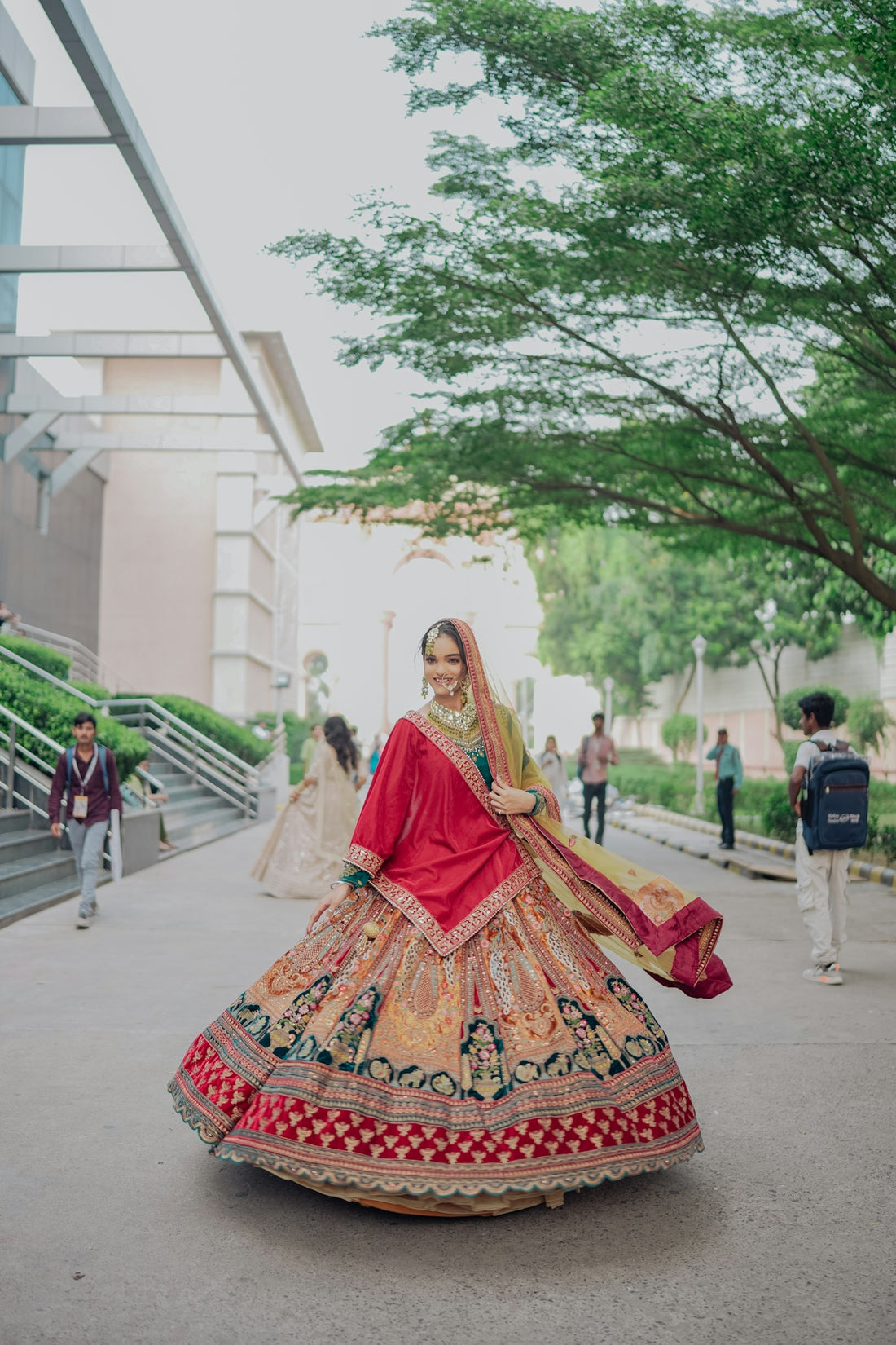 A woman in a colorful traditional indian outfit