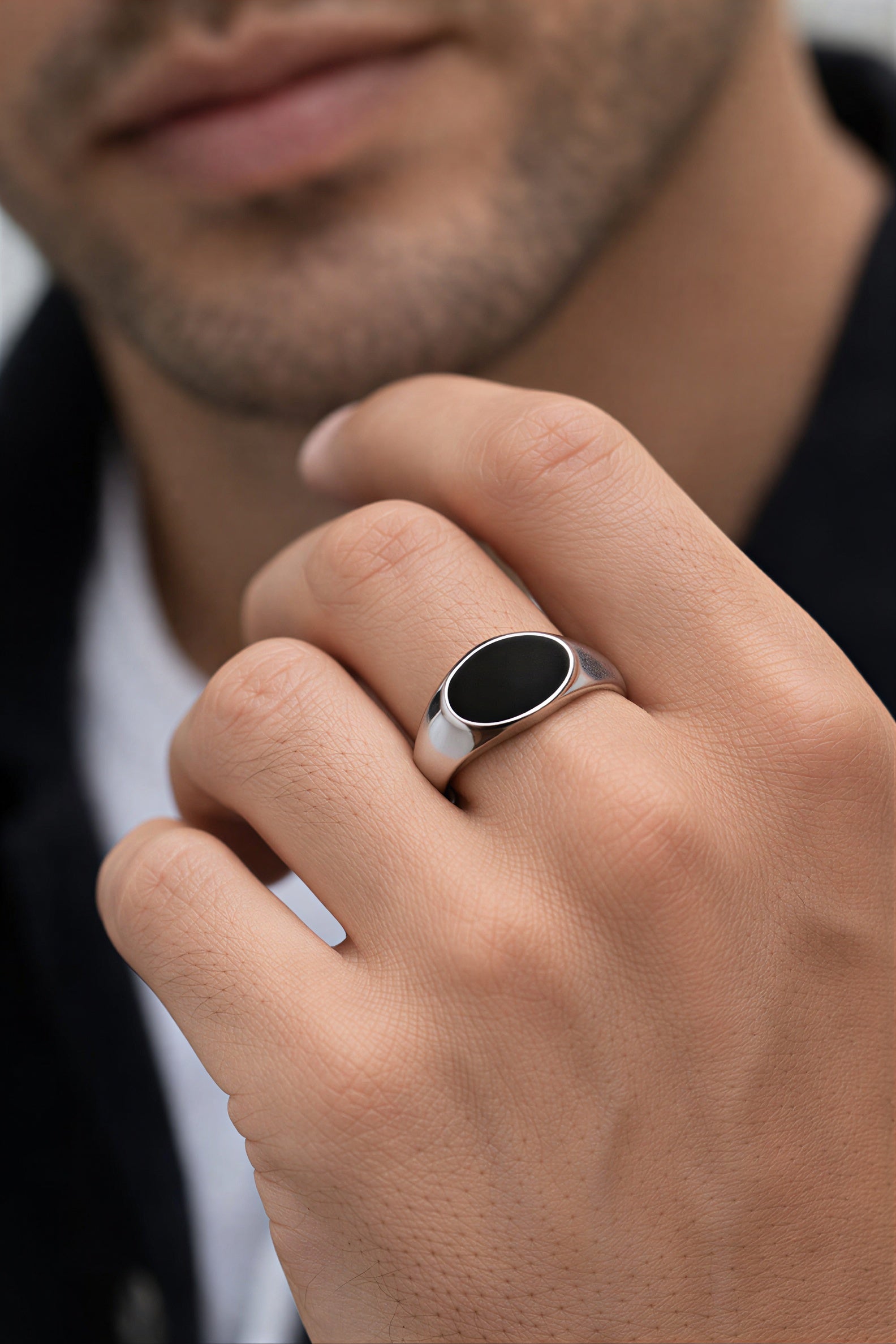 Mens black onyx ring wearing hand close view stylish stainless steel fashion ring