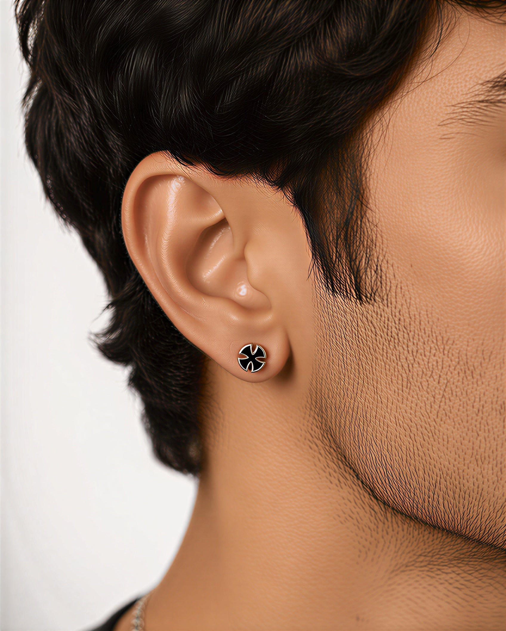 Stylish mens stud earrings model wearing side view black stainless steel